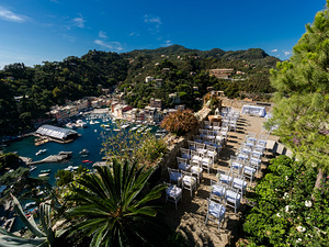 alt=Wedding ceremony at Castello Brown with panoramic Ligurian Sea view