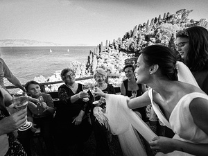 alt=Celebration moments during Irida & Steven’s destination wedding reception  Taglio torta