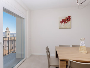 detail of the door with a view of the village from the holiday home