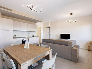 kitchen table with sofa, living room vacation home Lake Garda