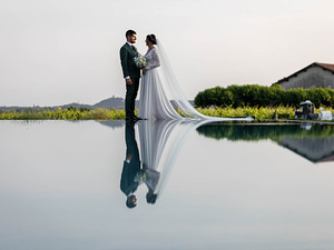 Elegant wedding photography at sunset on Lake Garda
