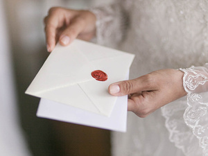alt=wedding message for the newlyweds with a wedding envelope